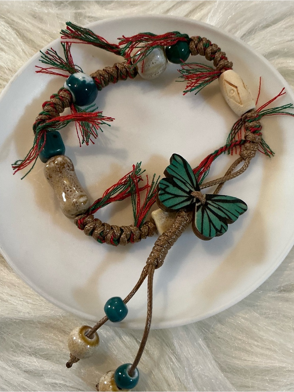 The prettiest blue/green butterfly bead/string boho hippie bracelet